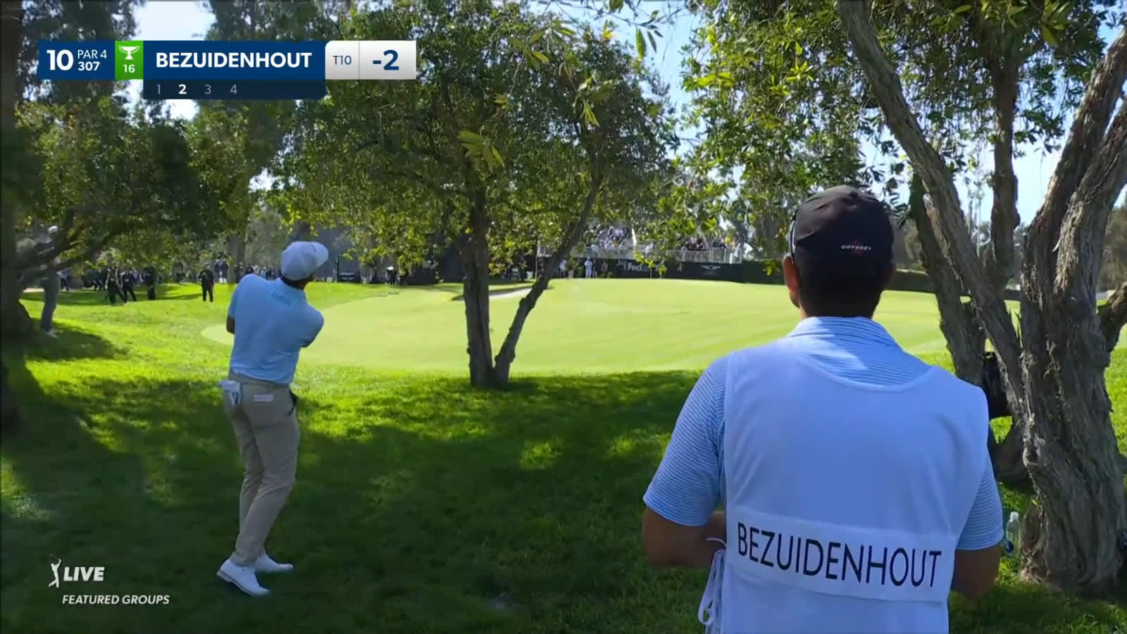 Christiaan Bezuidenhout punches out over the trees to setup birdie at Genesis