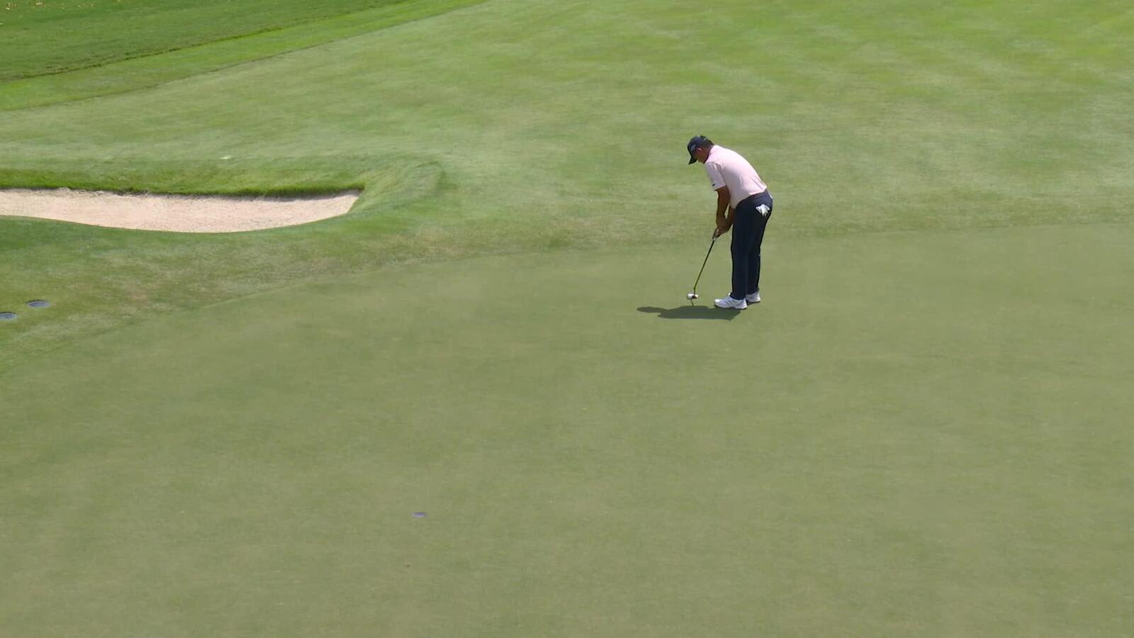 Si Woo Kim sinks a 22-foot birdie putt on No. 18 at FedEx St. Jude