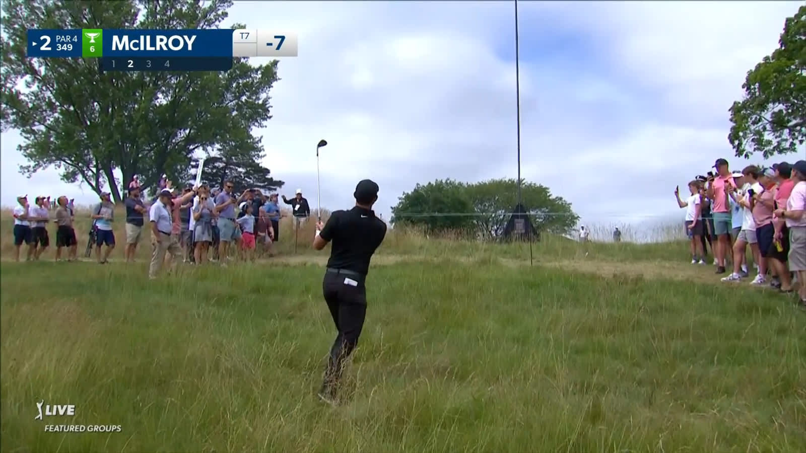Rory McIlroy gets out of deep rough to make birdie at Travelers