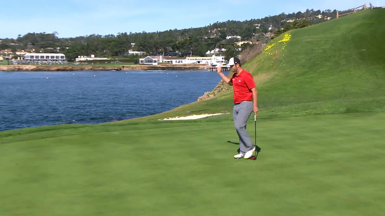 Jon Rahm drops in a 23-footer at AT&T Pebble Beach