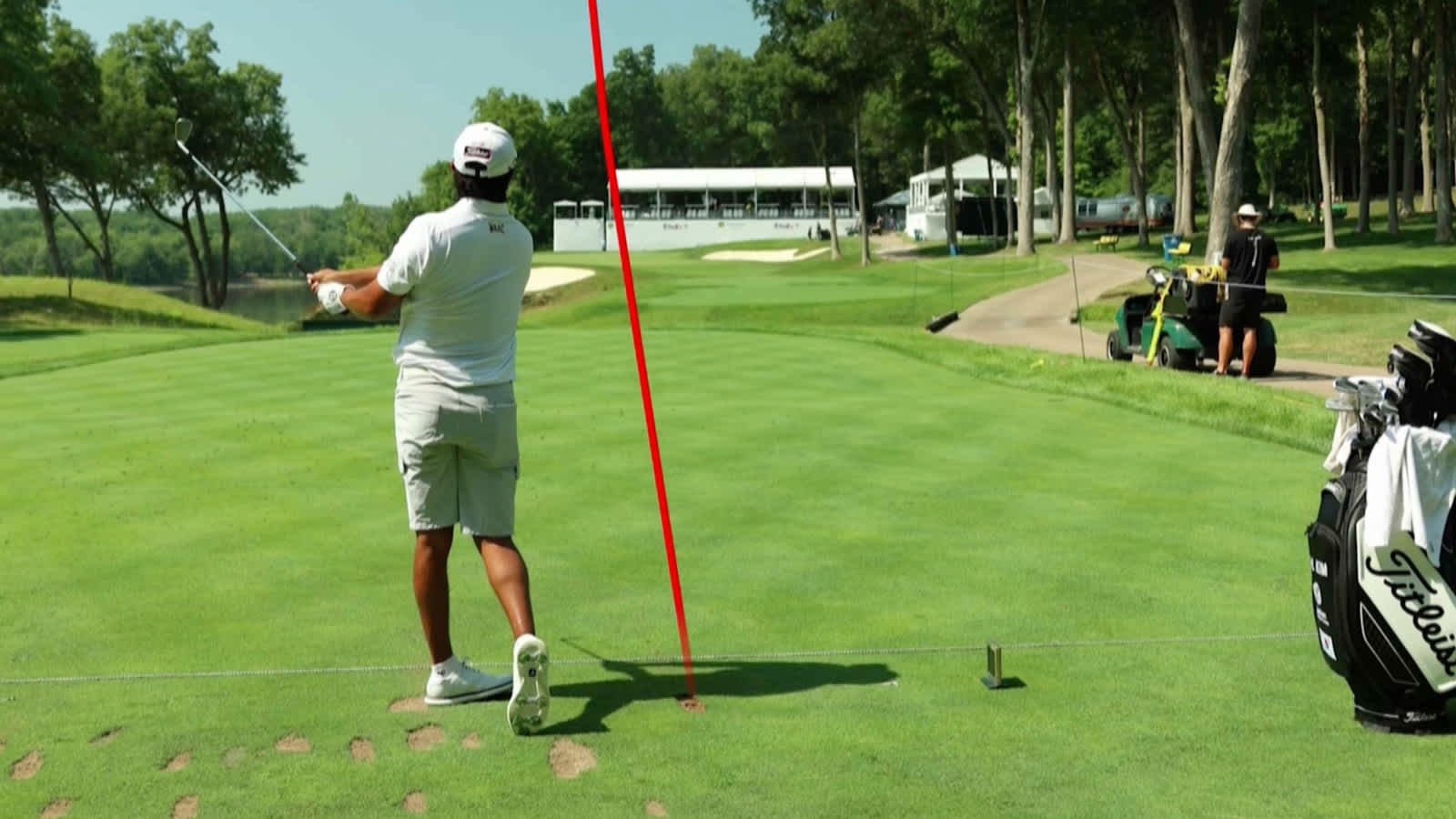 Shot trails on picturesque par-3 16th hole at TPC Deere Run
