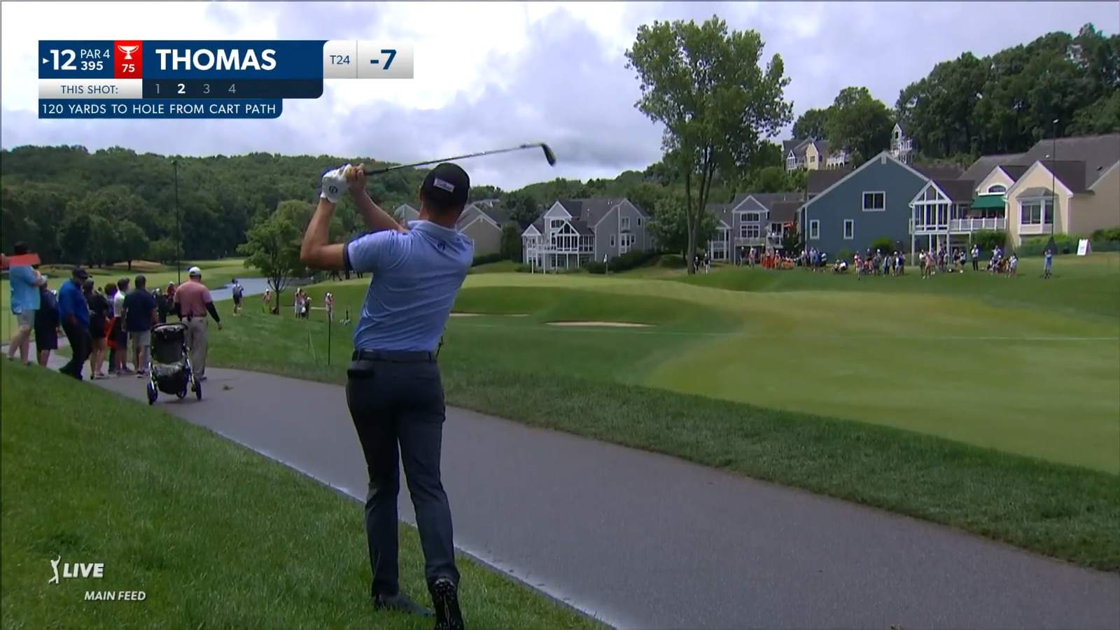 Justin Thomas throws a dart from the cart path to set up birdie at Travelers