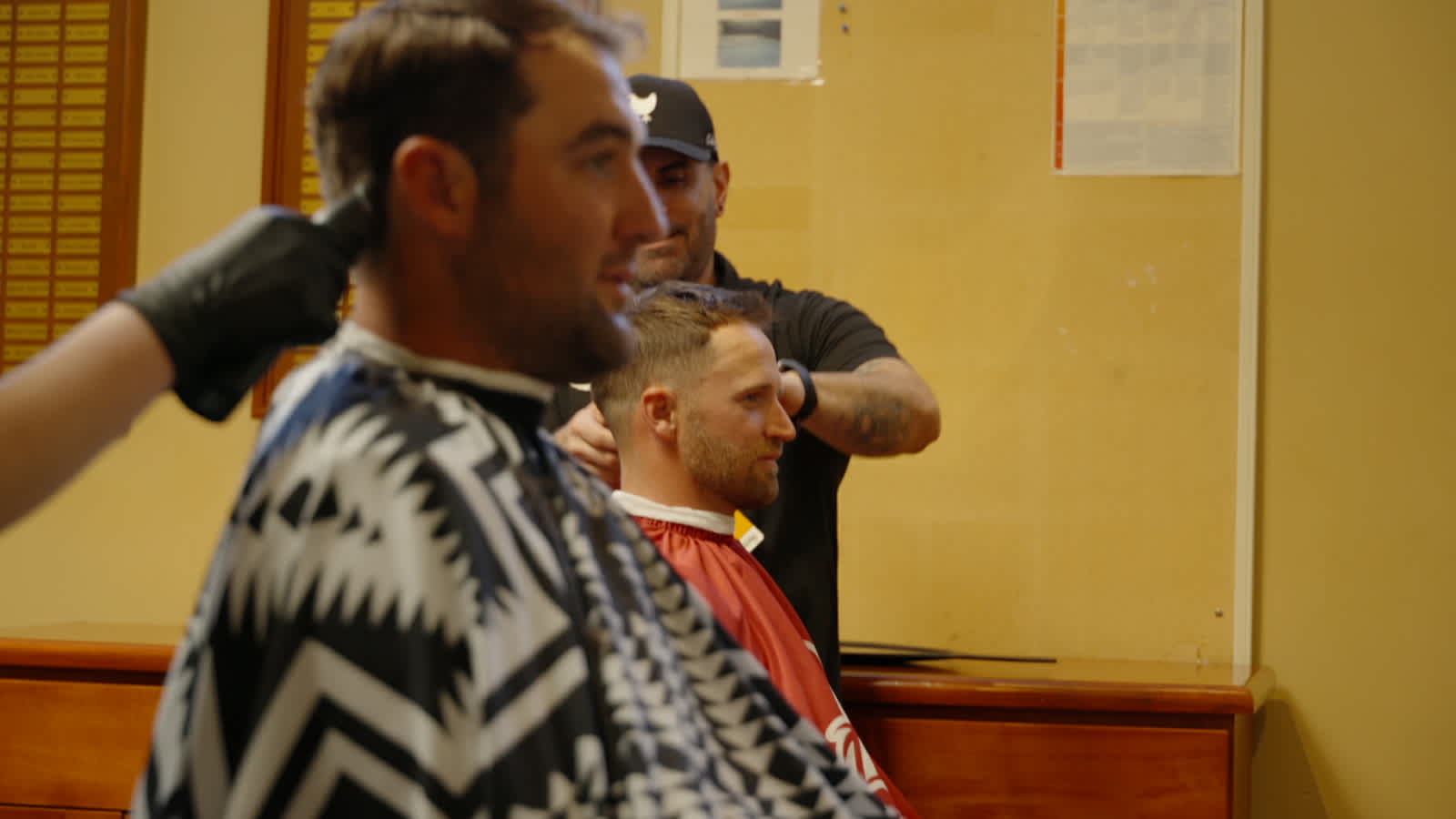 Wyndham Clark and Scottie Scheffler get haircuts before Genesis
