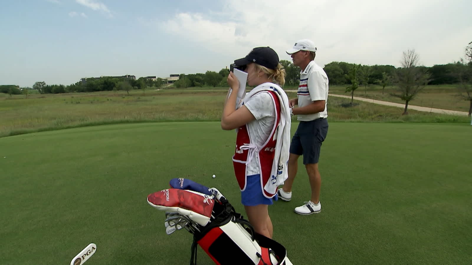 Steve Stricker's daughter, Izzy, caddies for him at KitchenAid Senior PGA