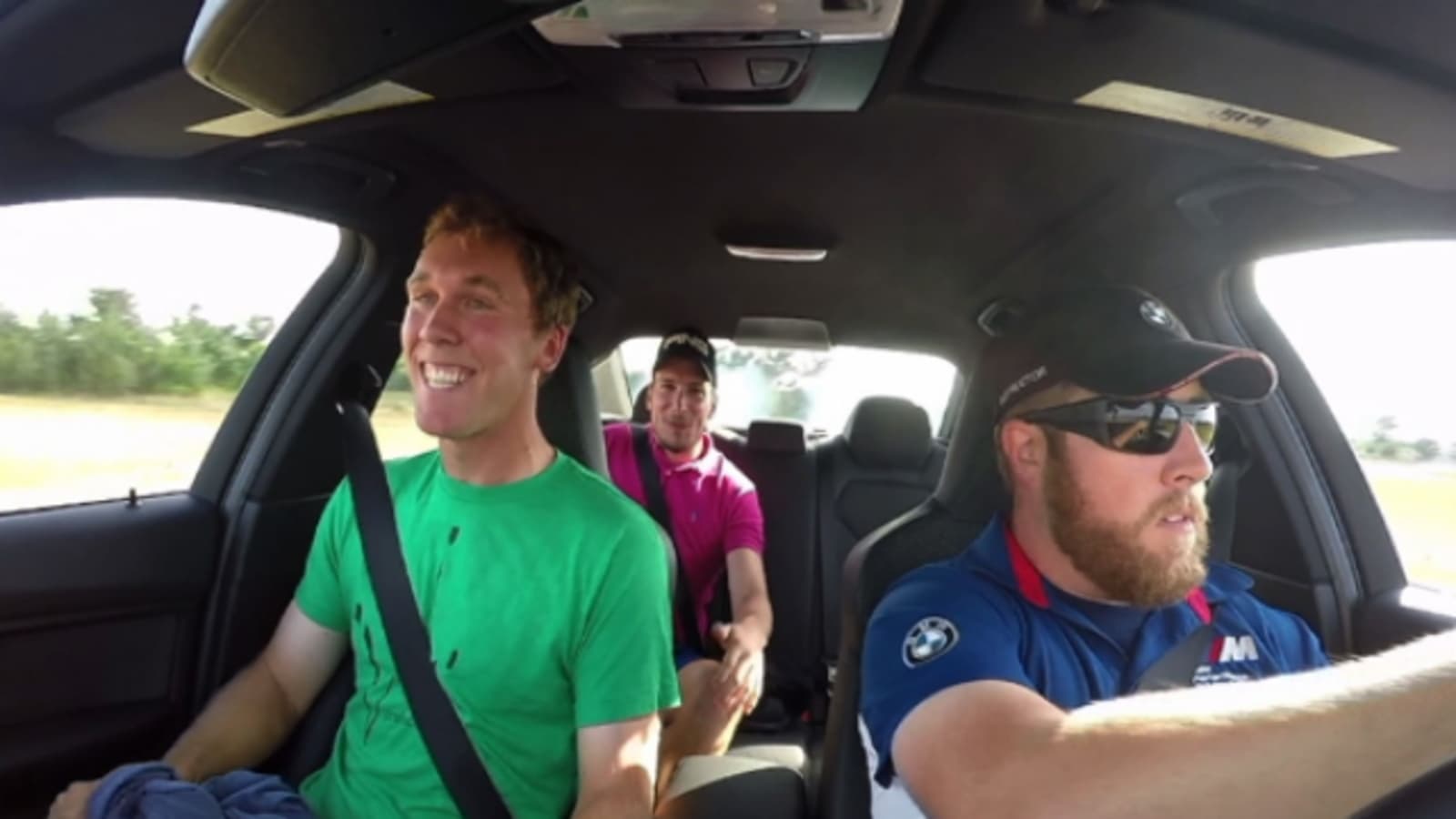 Players enjoy a thrilling ride at the BMW Charity Pro-Am