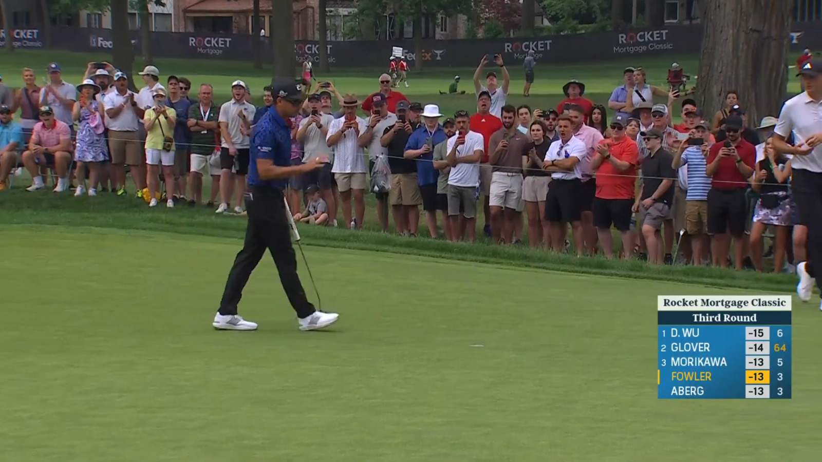 Rickie Fowler rolls in birdie putt at Rocket Mortgage
