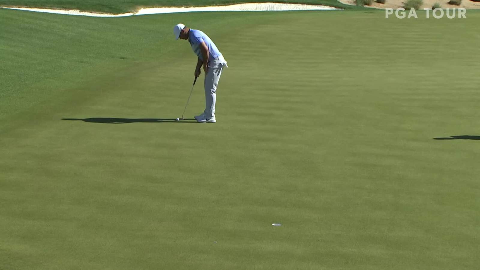 Brooks Koepka rolls in eagle putt at Waste Management