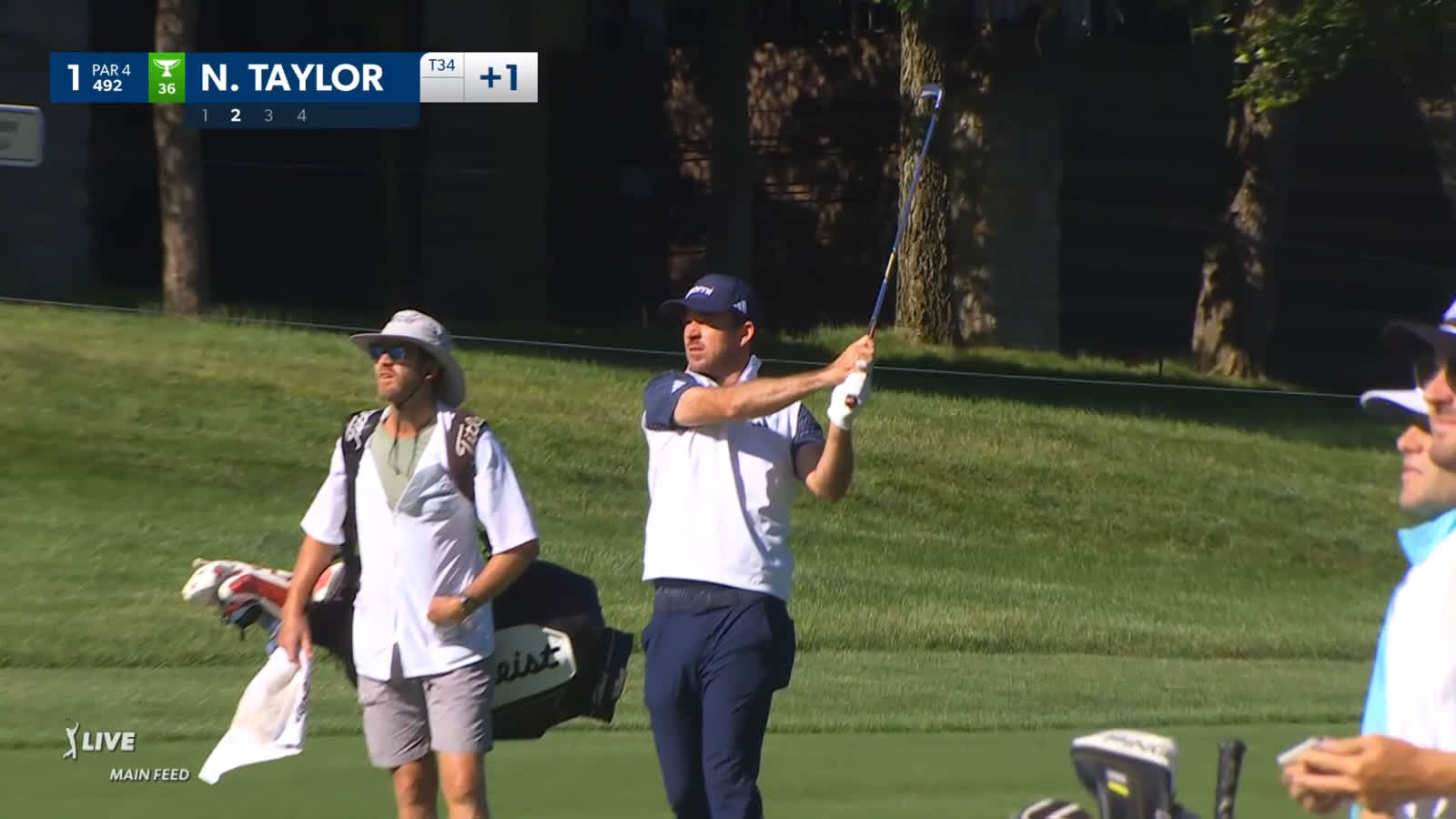 Nick Taylor plays the slope to set up birdie at the Memorial