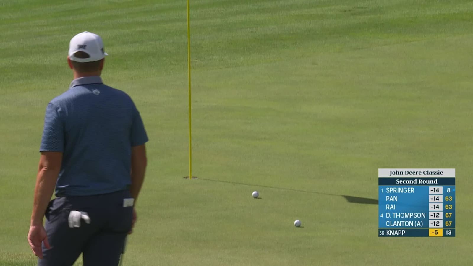 Jake Knapp checks chip shot next to hole and birdies at John Deere