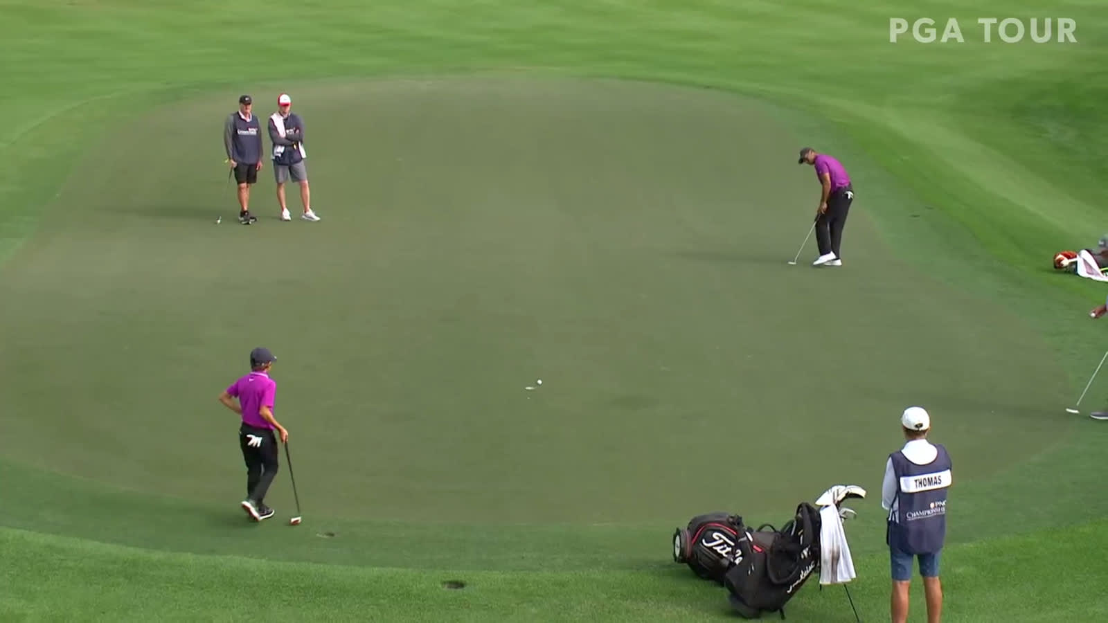 Charlie Woods' approach leads to Tiger birdie putt at PNC Championship