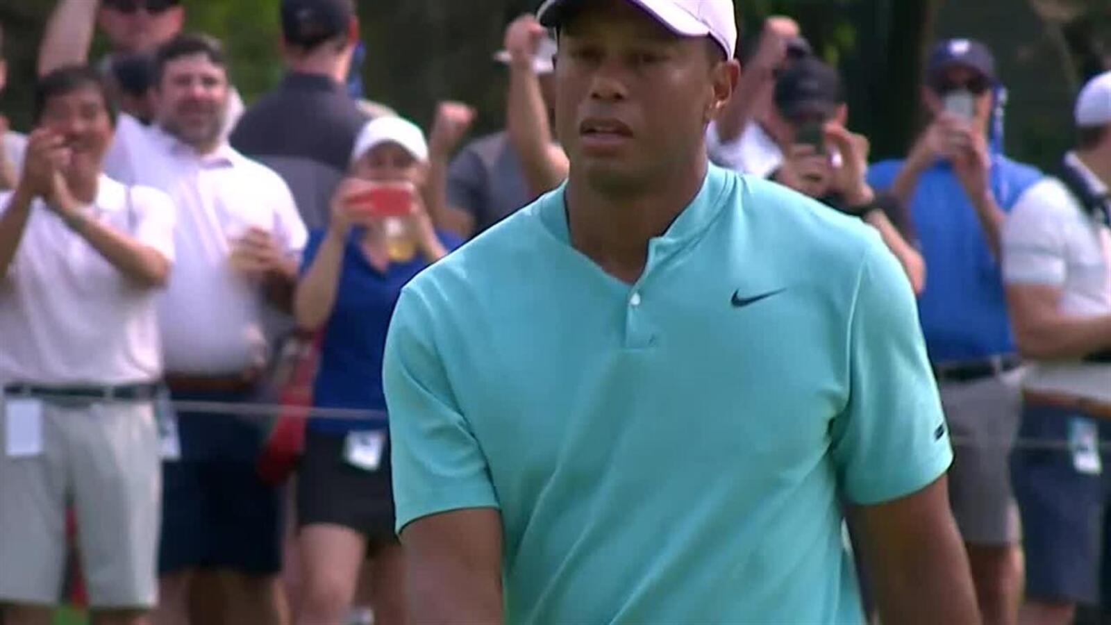 Tiger Woods rolls in 23-footer for birdie at the Memorial