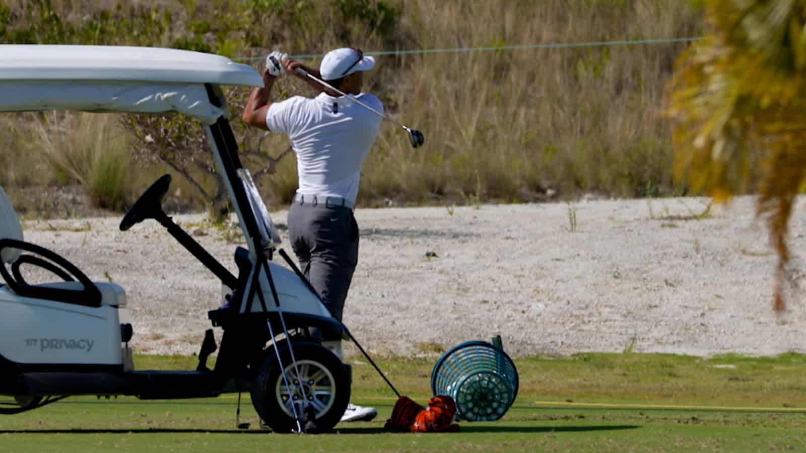 Tiger Woods back on the range at 2021 Hero