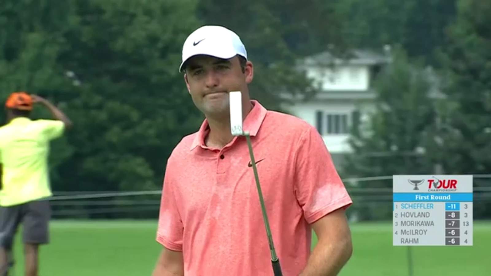 Scottie Scheffler curls in a 32-foot birdie putt at TOUR Championship
