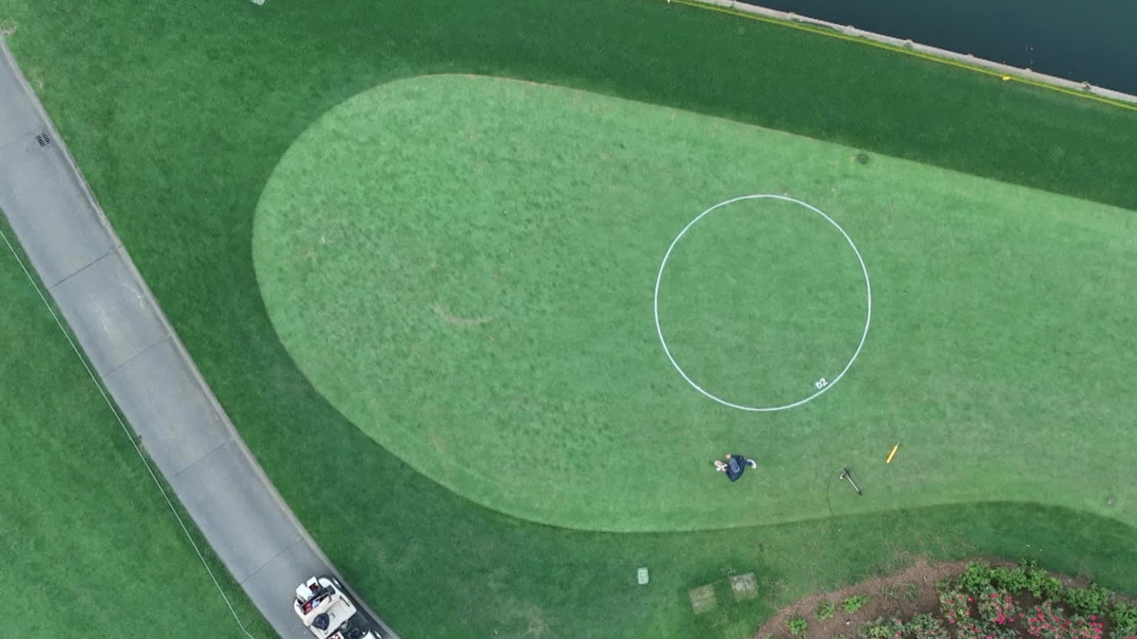 Behind the scenes: painting the drop zone circle on No. 17 at TPC Sawgrass