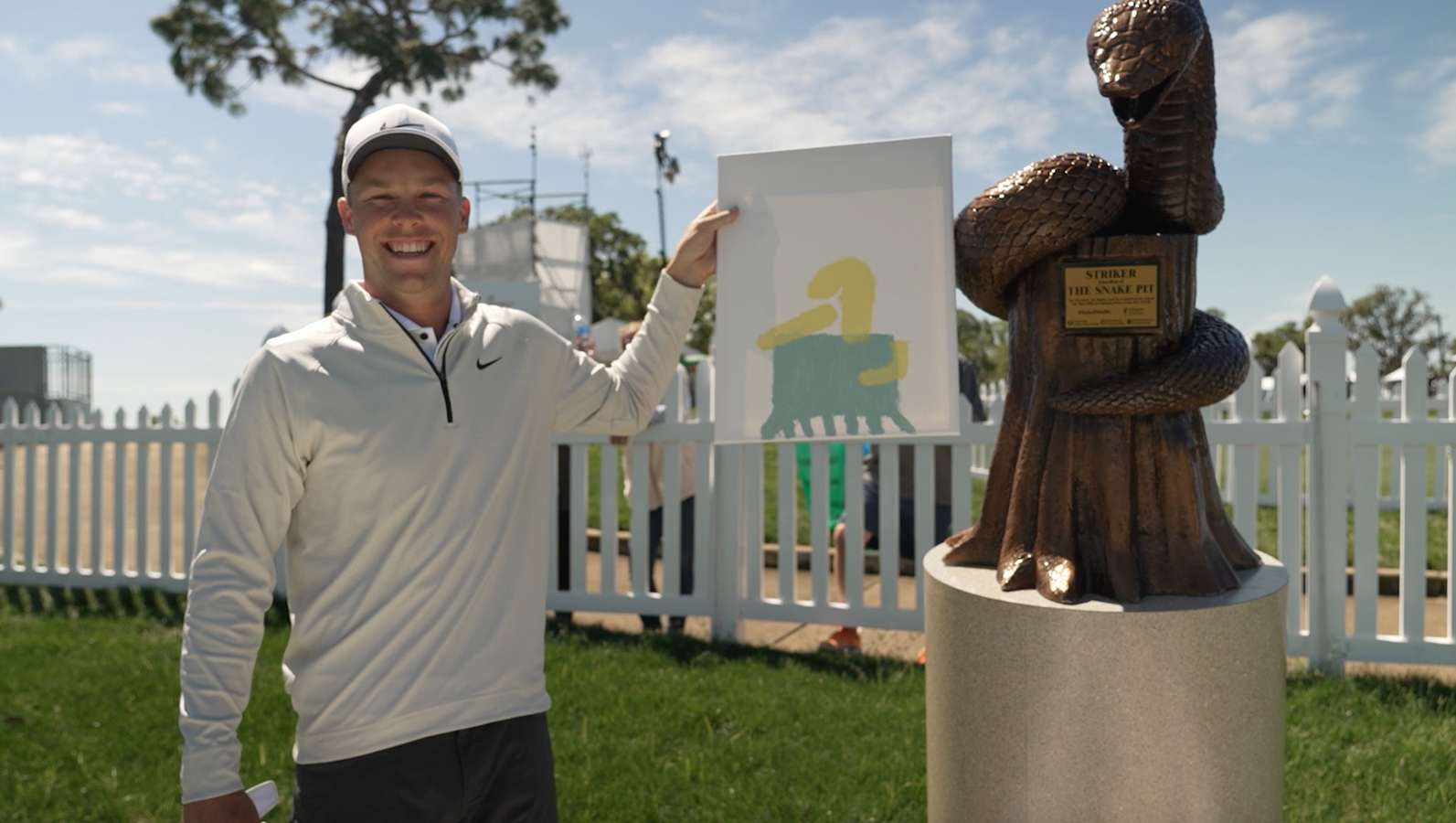 Nick Hardy paints the Valspar Championship trophy