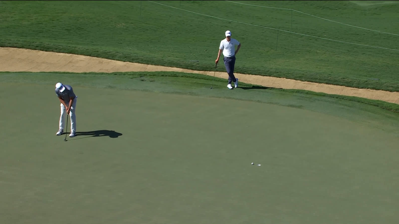 Corey Conners drills in birdie putt at The Sentry