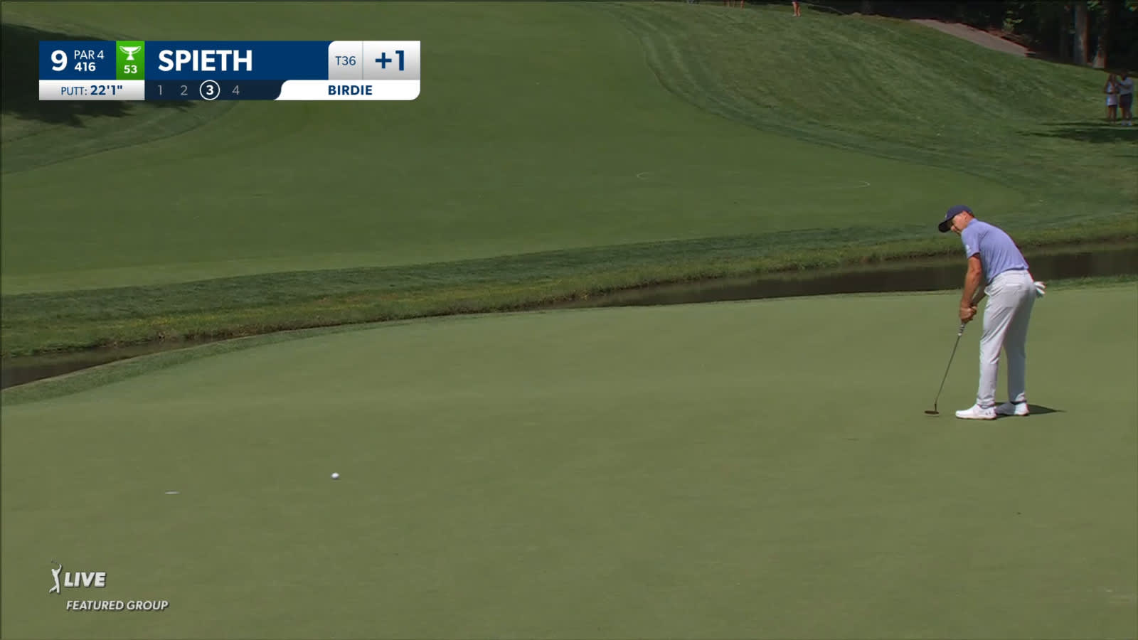 Jordan Spieth sinks a 22-foot birdie putt at the Memorial