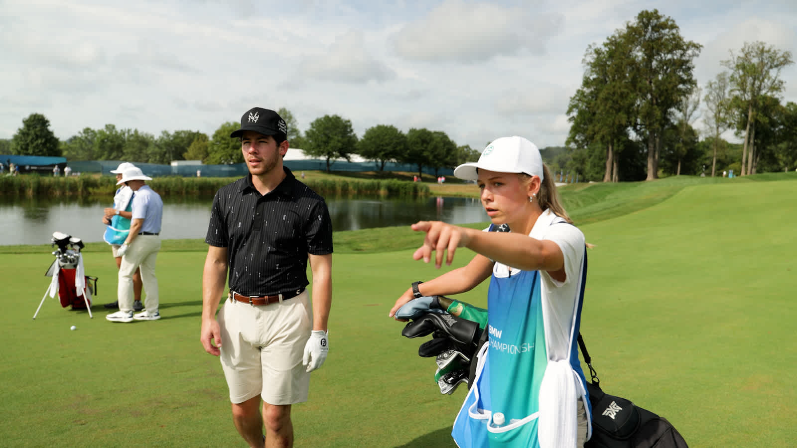 Evans Scholar caddies for Nick Jonas at BMW Championship