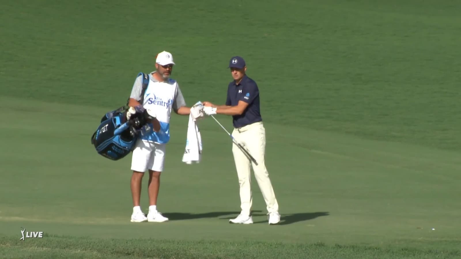 Jordan Spieth and Michael Greller conversations during Round 3 at Sentry