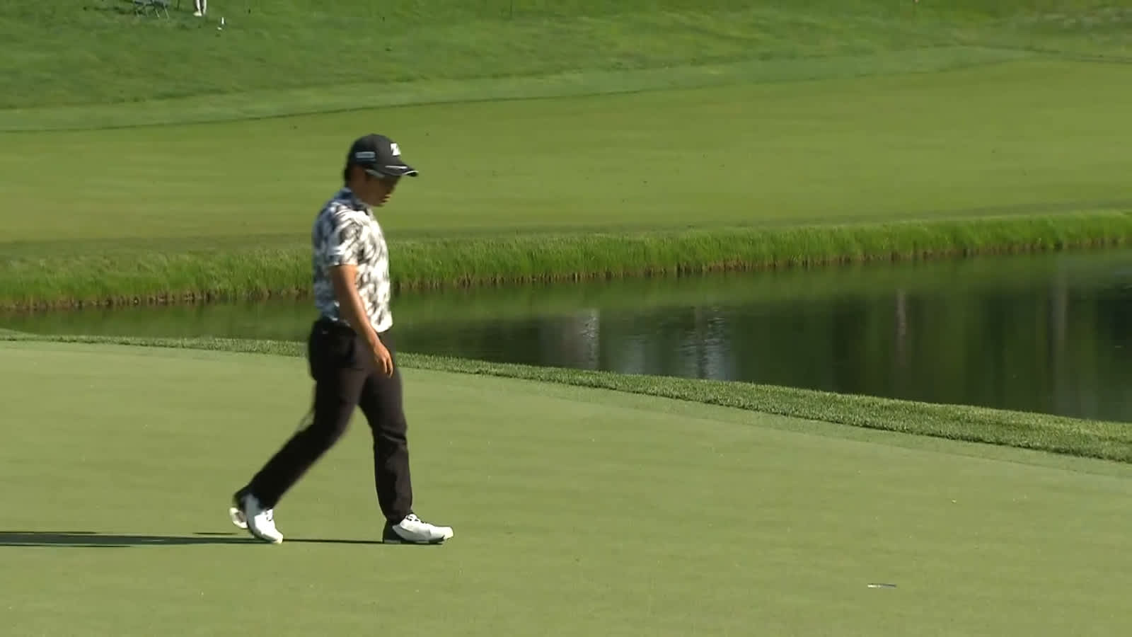 Kazuki Higa sinks 17-footer for birdie at the Memorial
