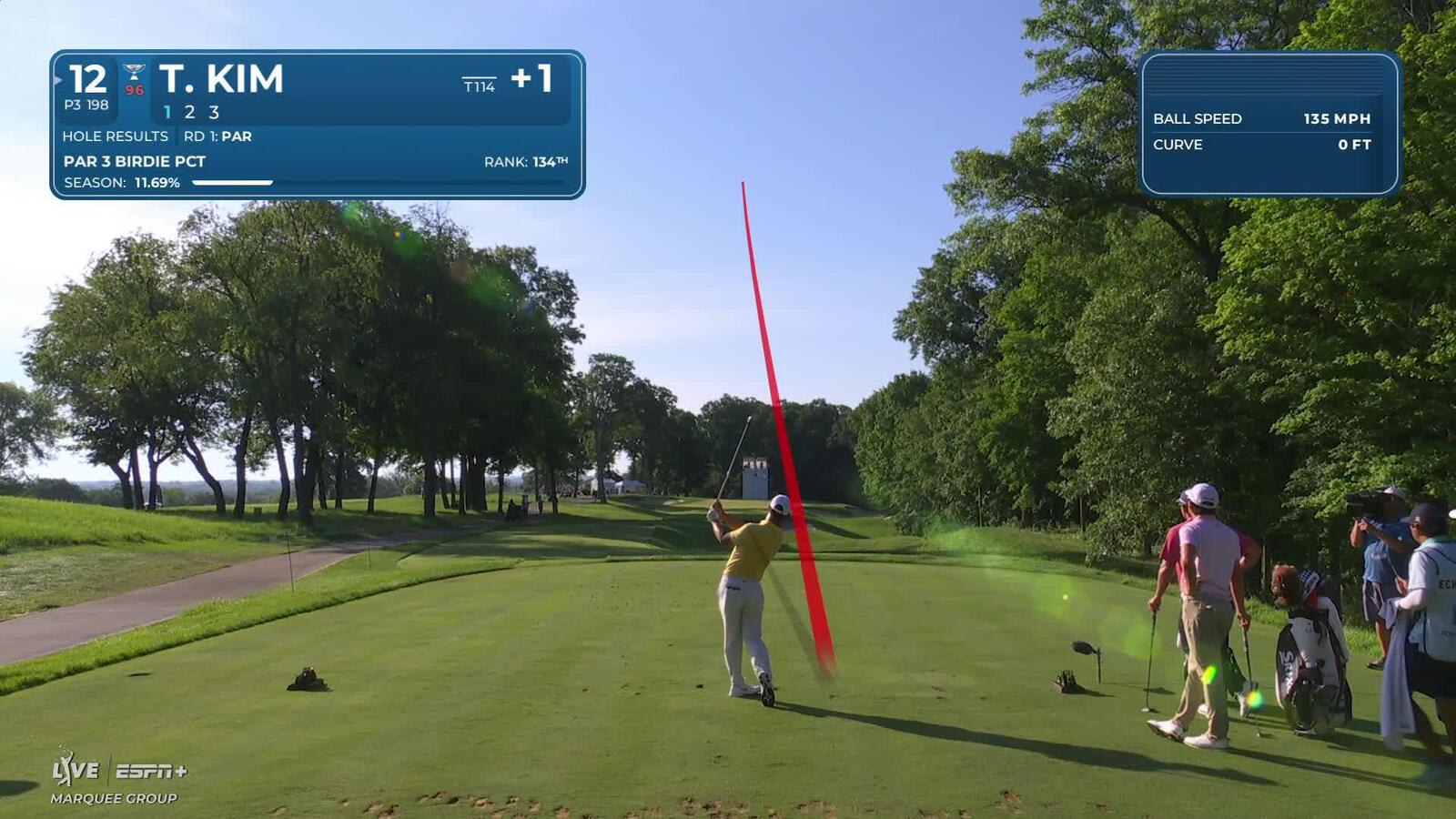 Tom Kim sinks a 22-foot birdie putt on No. 12 at John Deere