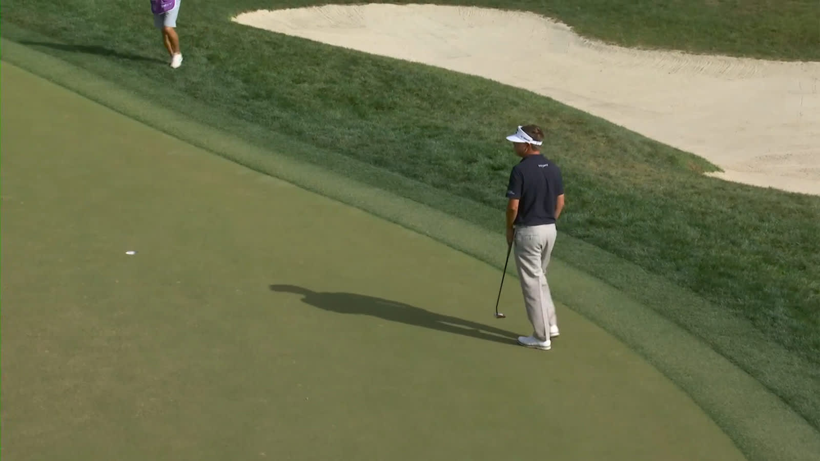 Keith Mitchell rolls in an eagle putt on No. 14 at Valspar