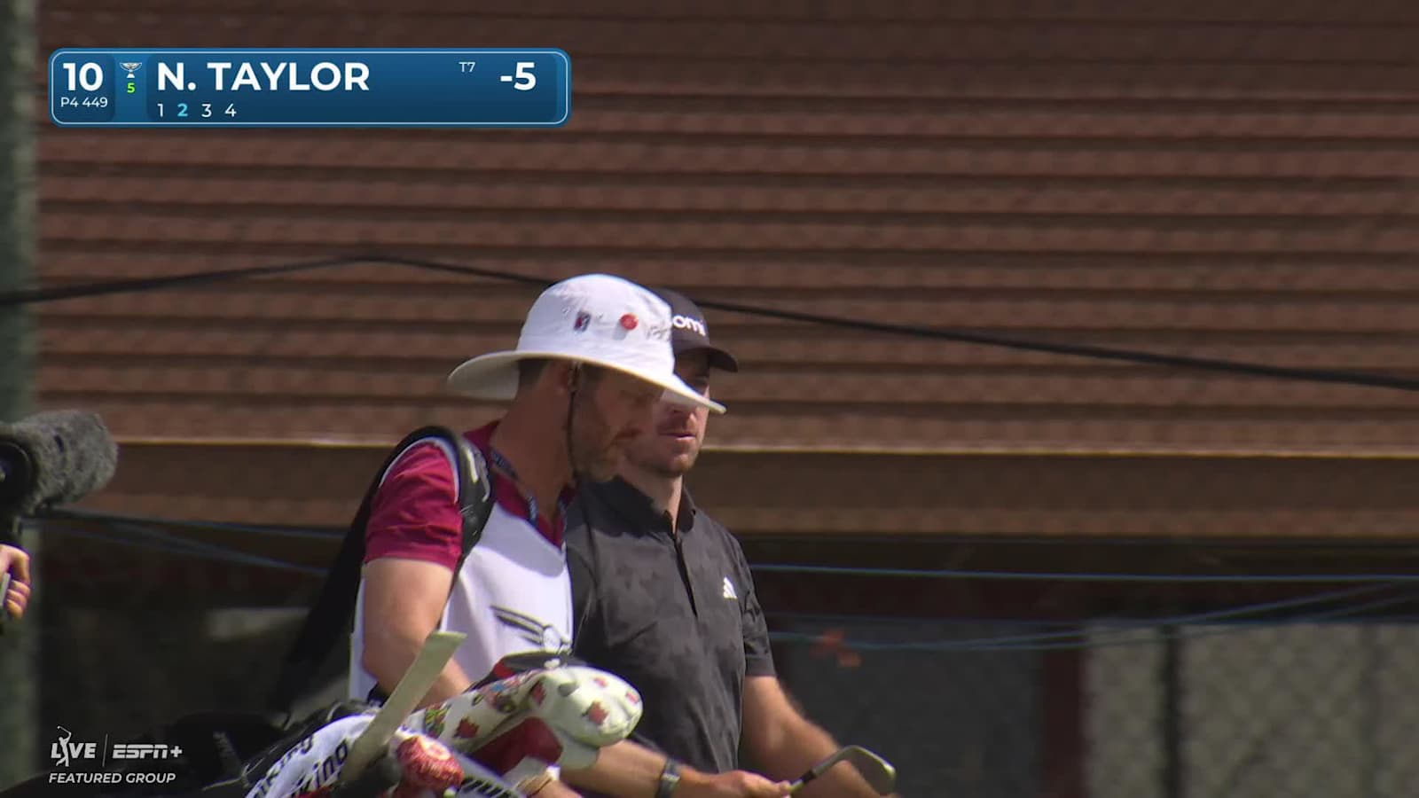 Nick Taylor hits it pin-high from ball below feet and birdies at The Genesis
