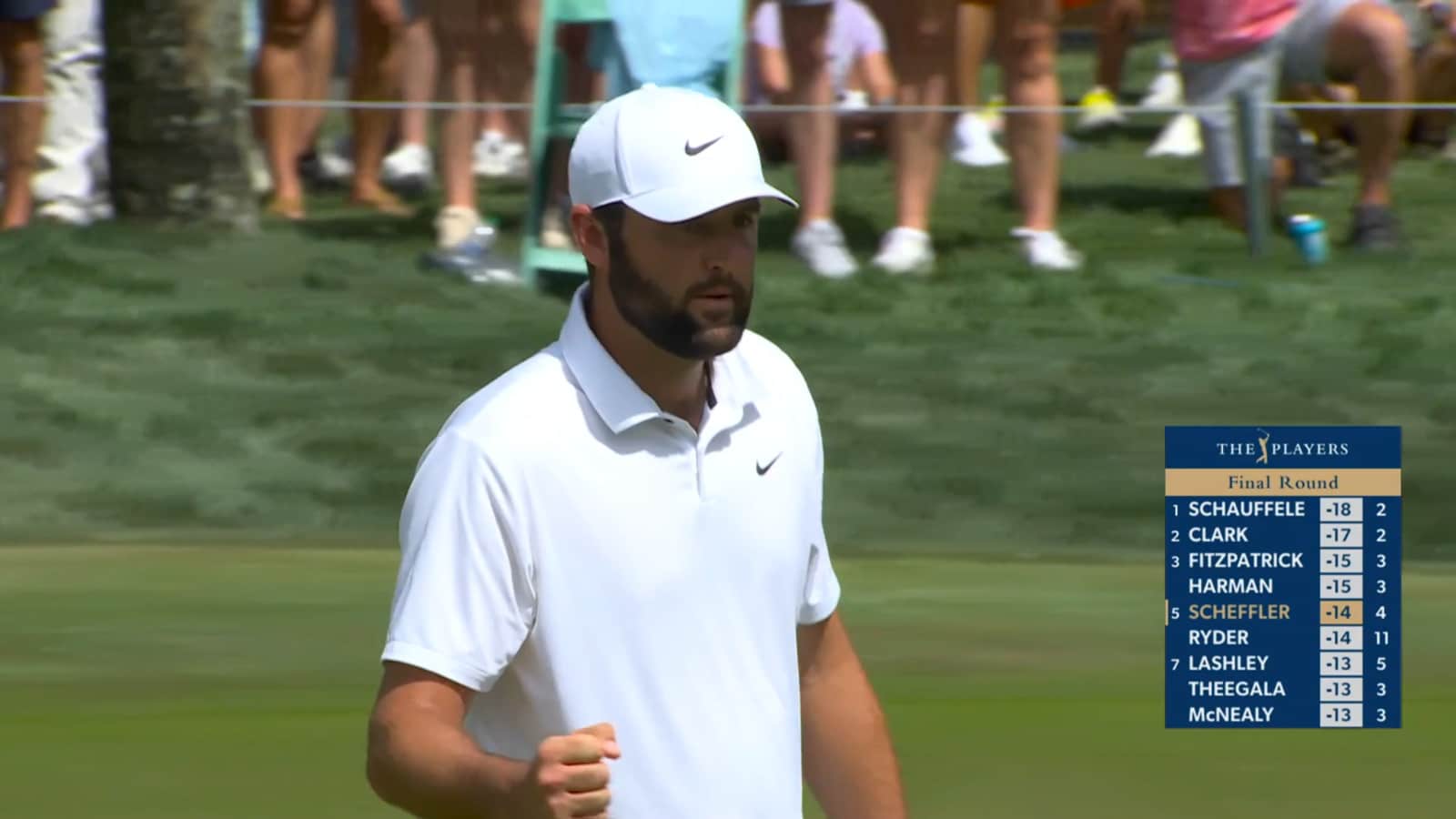 Scottie Scheffler rolls in an 18-foot birdie putt at THE PLAYERS