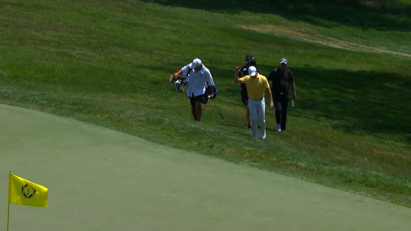 Rory McIlroy chips in for birdie at the Memorial