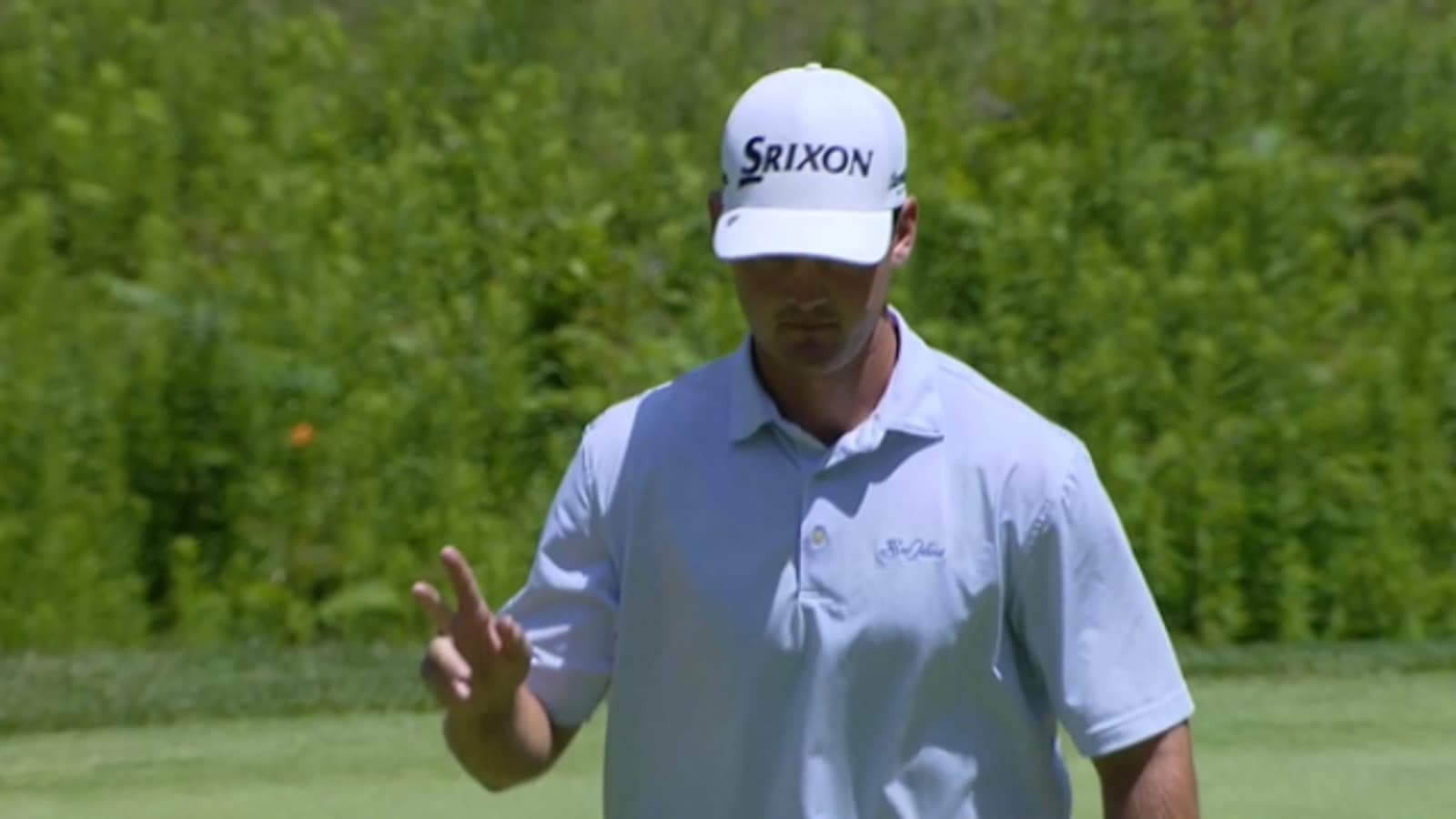Rick Lamb drains a lengthy birdie putt on No. 15 at LECOM