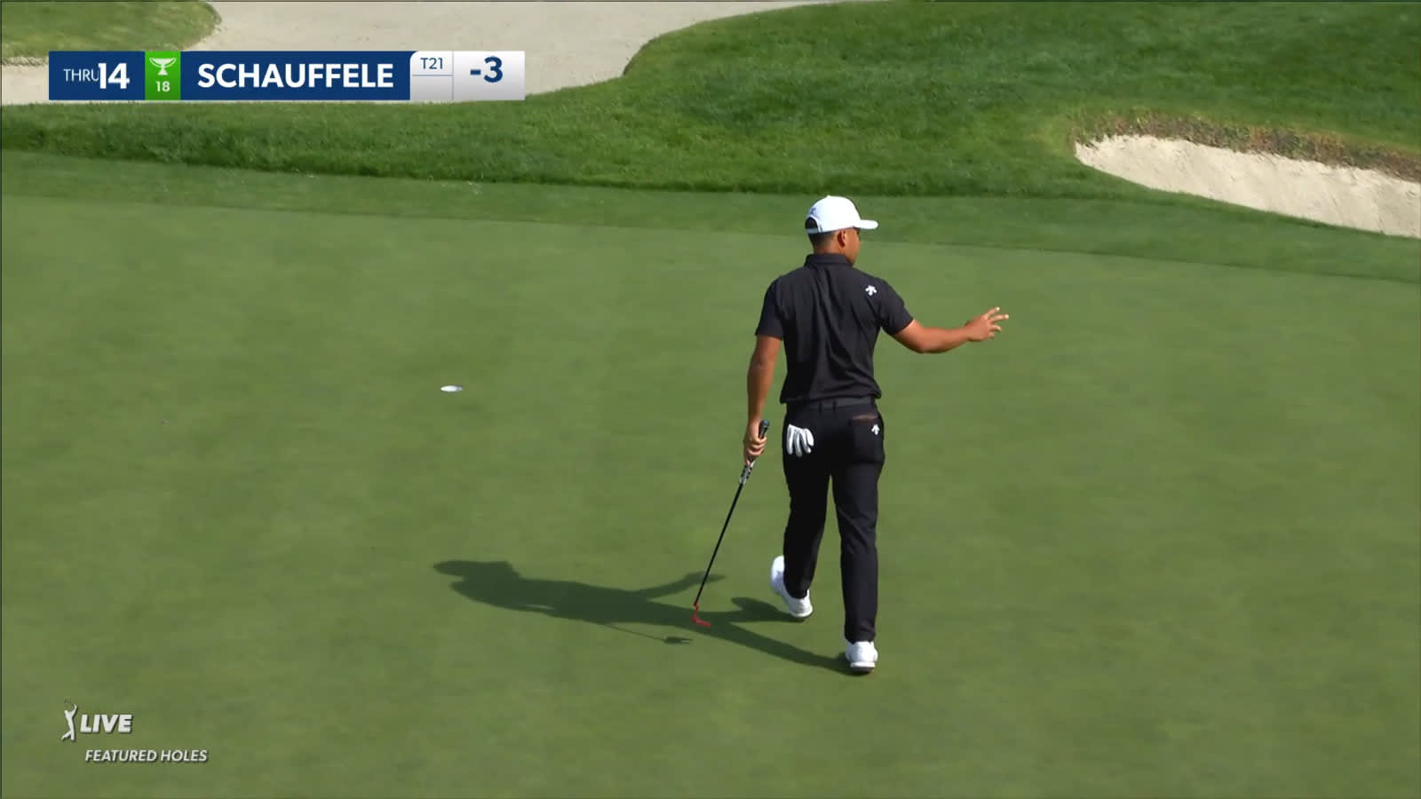 Xander Schauffele makes an 18-foot putt for birdie at Genesis