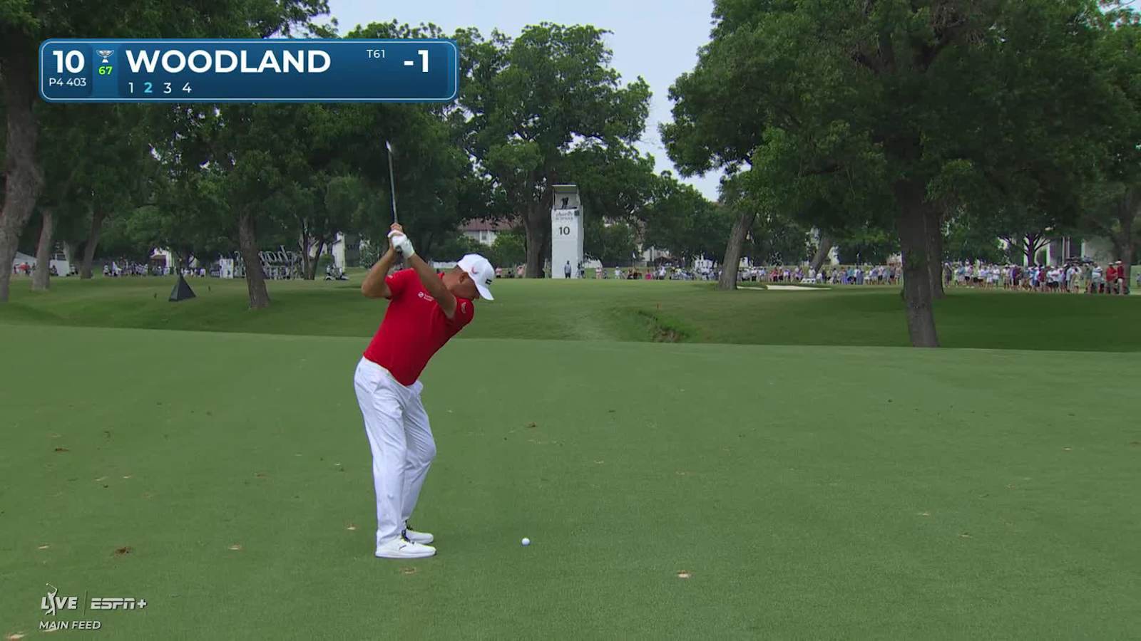 Gary Woodland sinks a 24-foot birdie putt on No. 10 at Charles Schwab