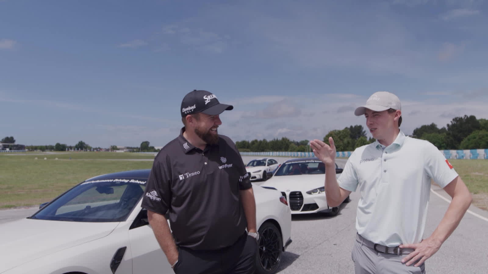 Matt Fitzpatrick and Shane Lowry race cars in timed run