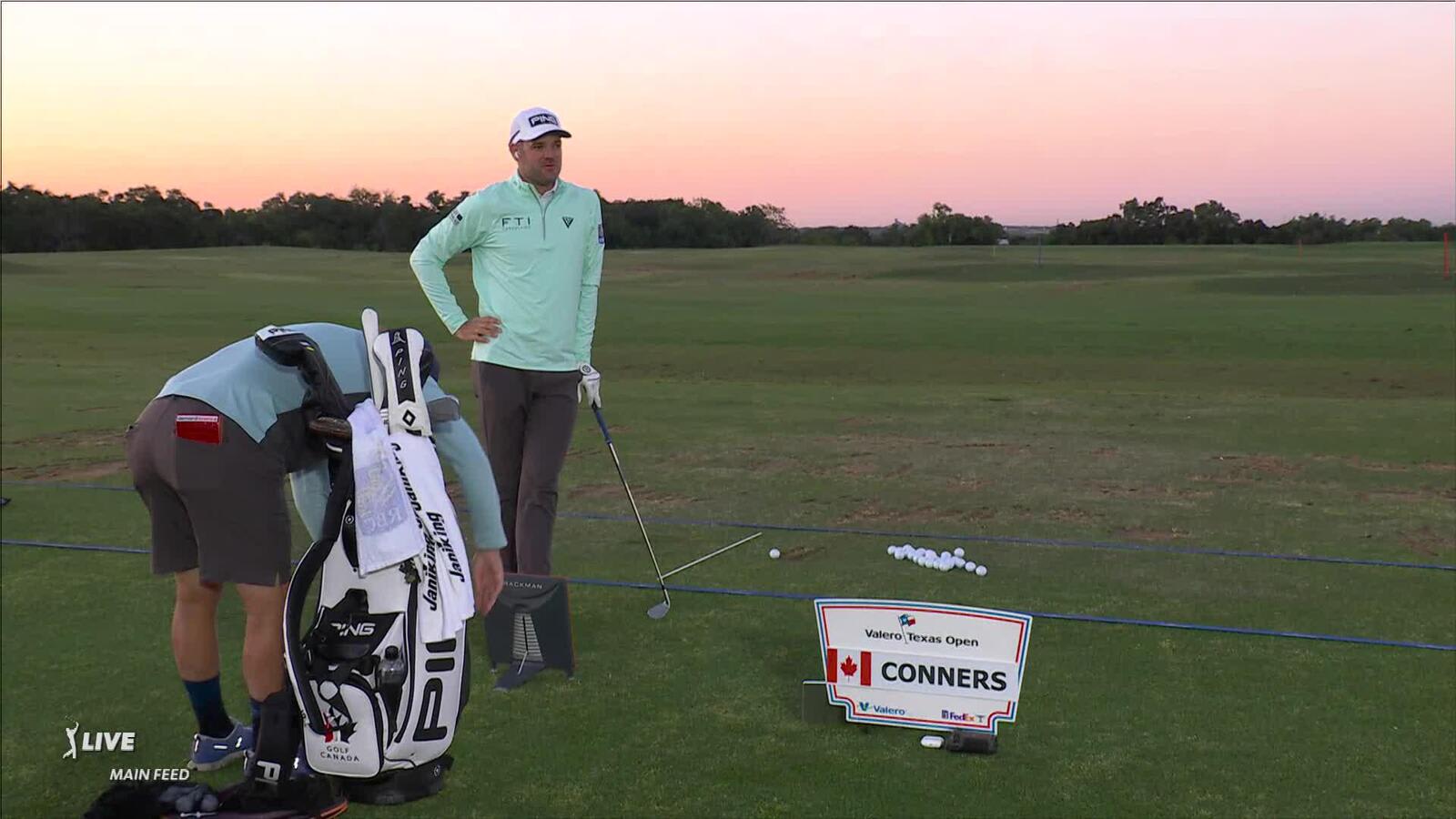Corey Conners on the range prior to Valero Texas Open