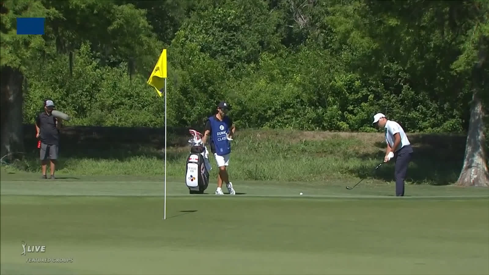 Si Woo Kim uses hybrid from off the green to roll in birdie putt at Zurich Classic