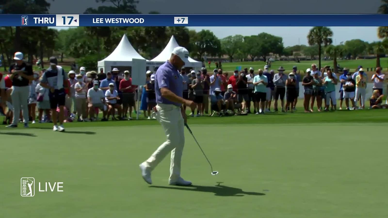Lee Westwood clears the water and putts for birdie on No. 8 in Round 2 at The Honda Classic