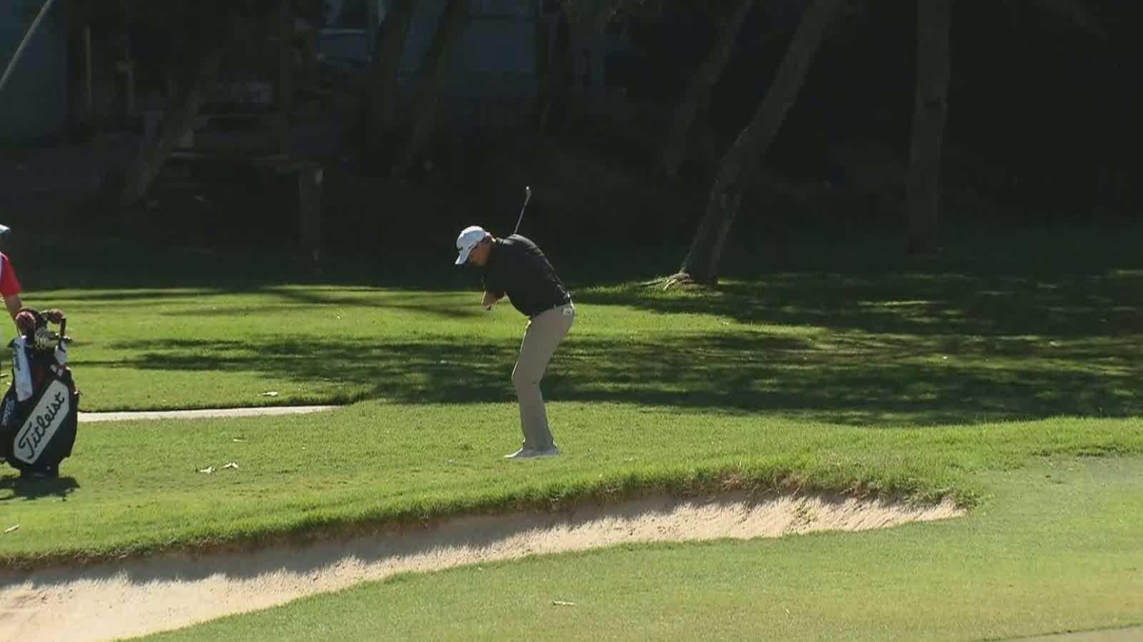 Patton Kizzire rattles the flag for an eagle at Sony Open