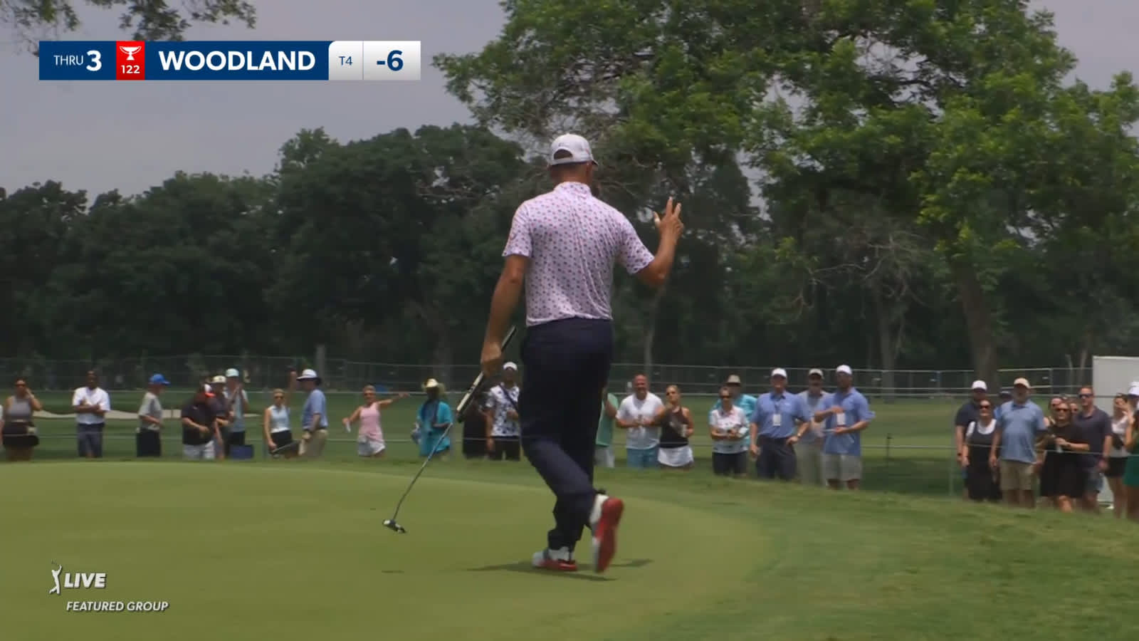 Gary Woodland holes par-saver from fringe at Charles Schwab