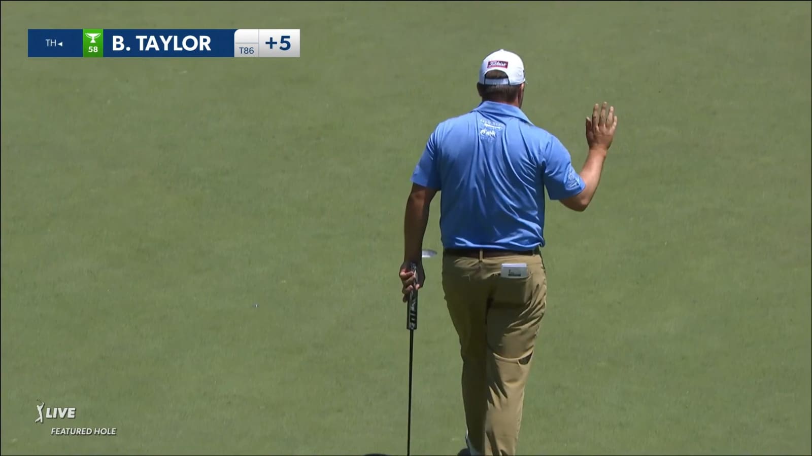 Ben Taylor cards an eagle at the Memorial