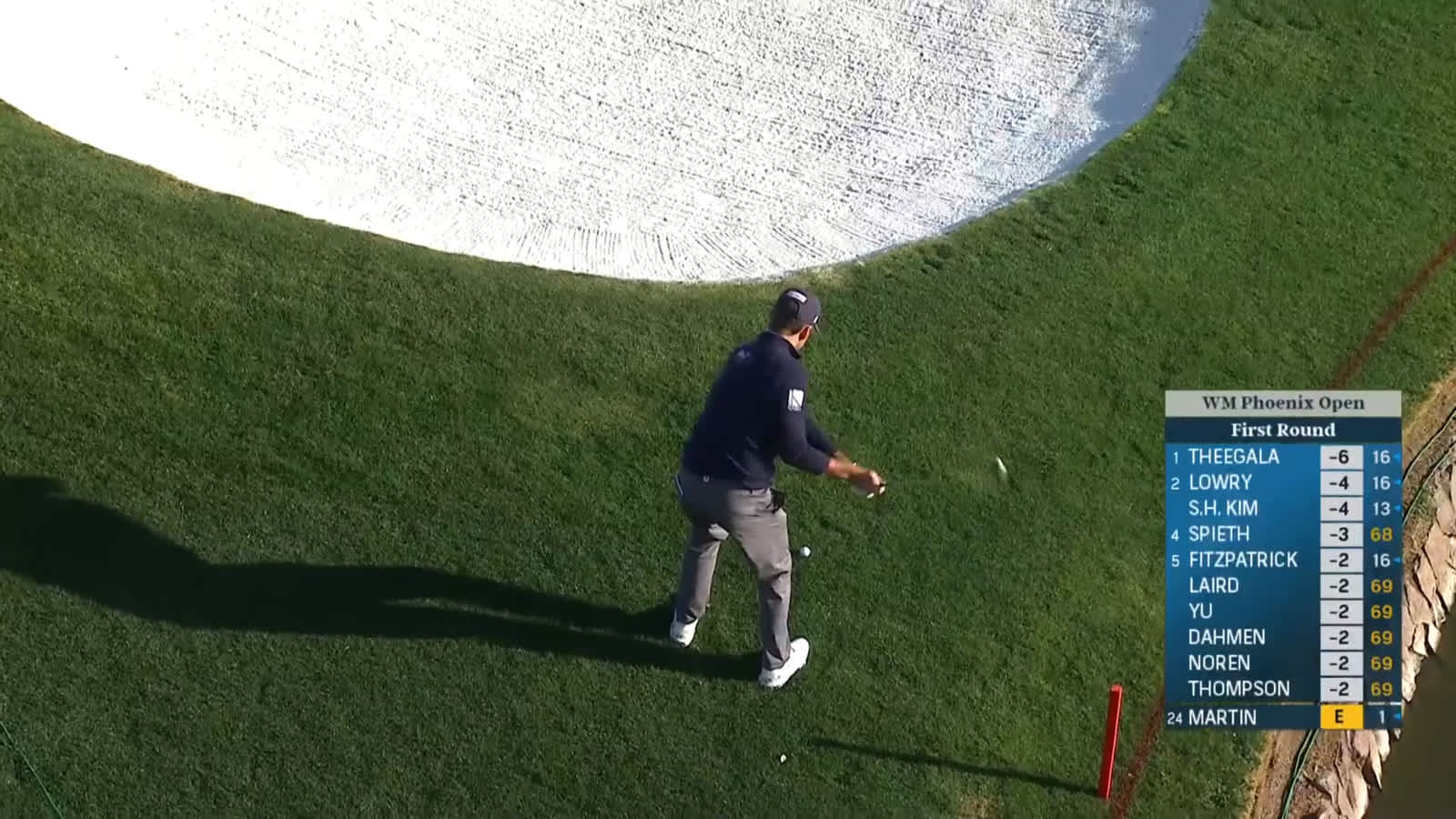 Ben Martin holes his par-save from the greenside rough at WM Phoenix Open