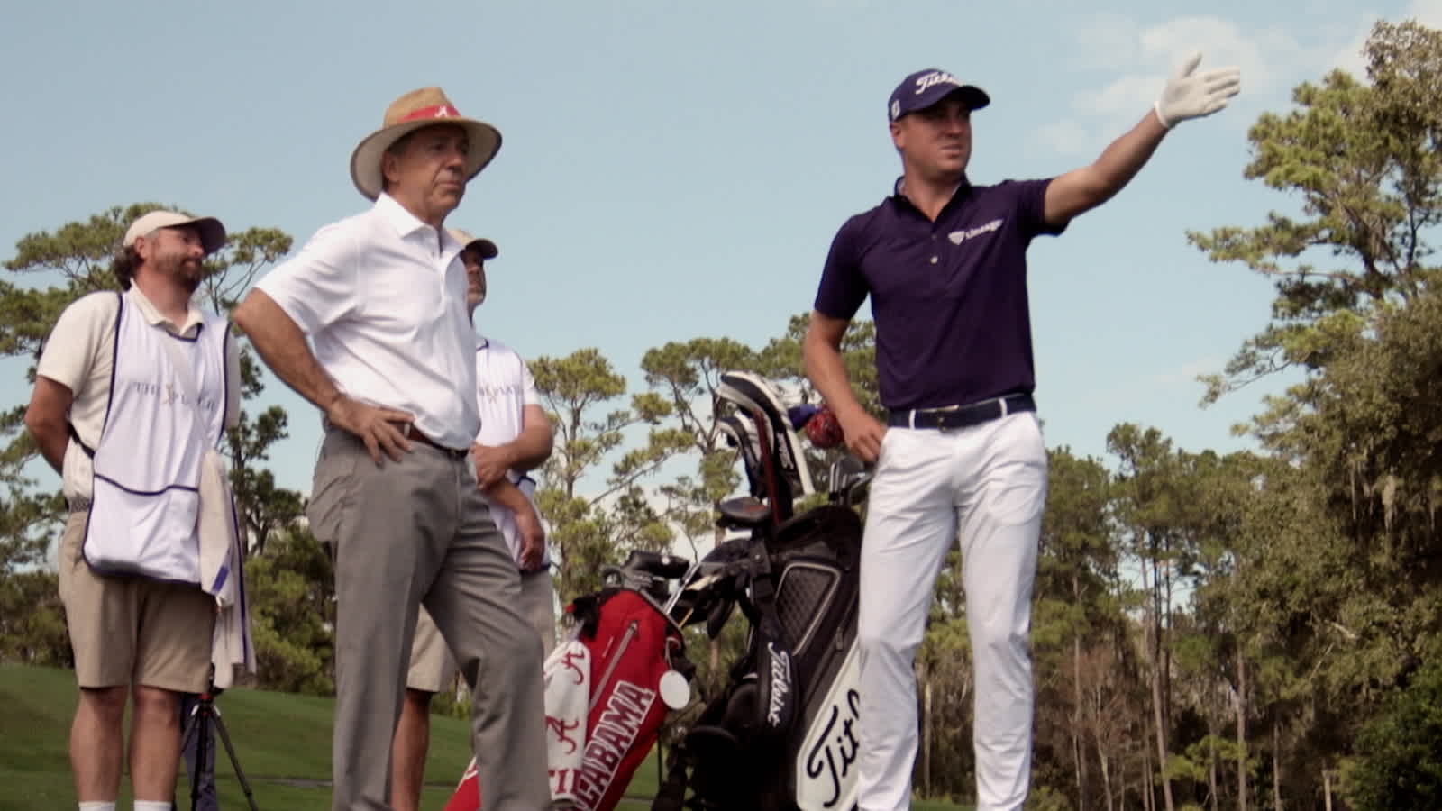 Justin Thomas and Nick Saban play a round of golf at TPC Sawgrass