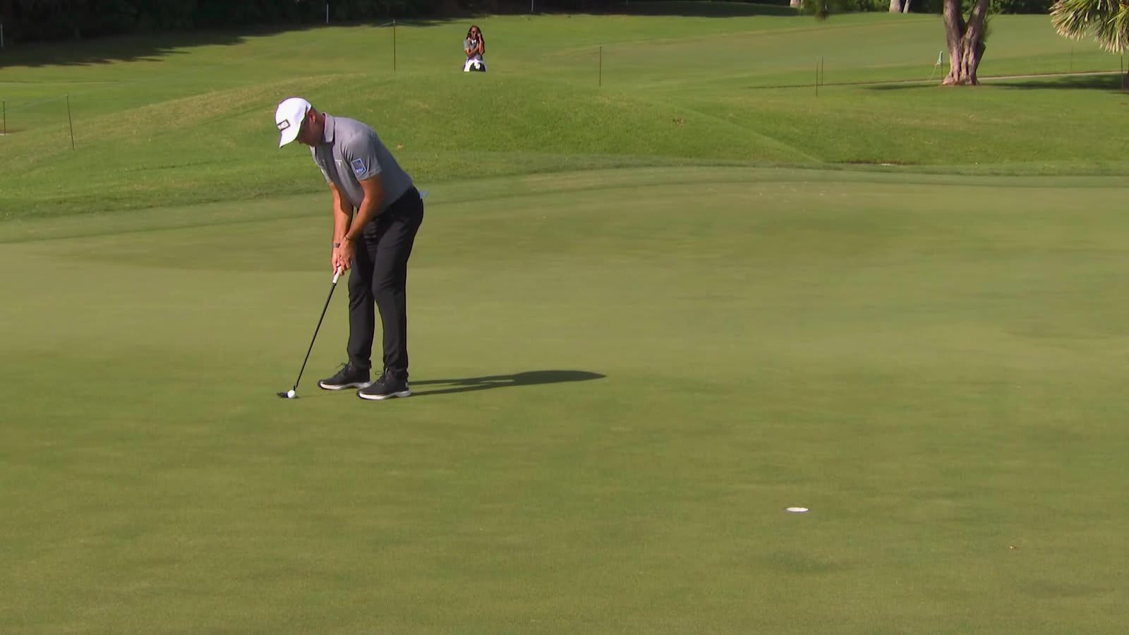 Corey Conners drains 18-foot putt for birdie on No. 5 at Butterfield Bermuda