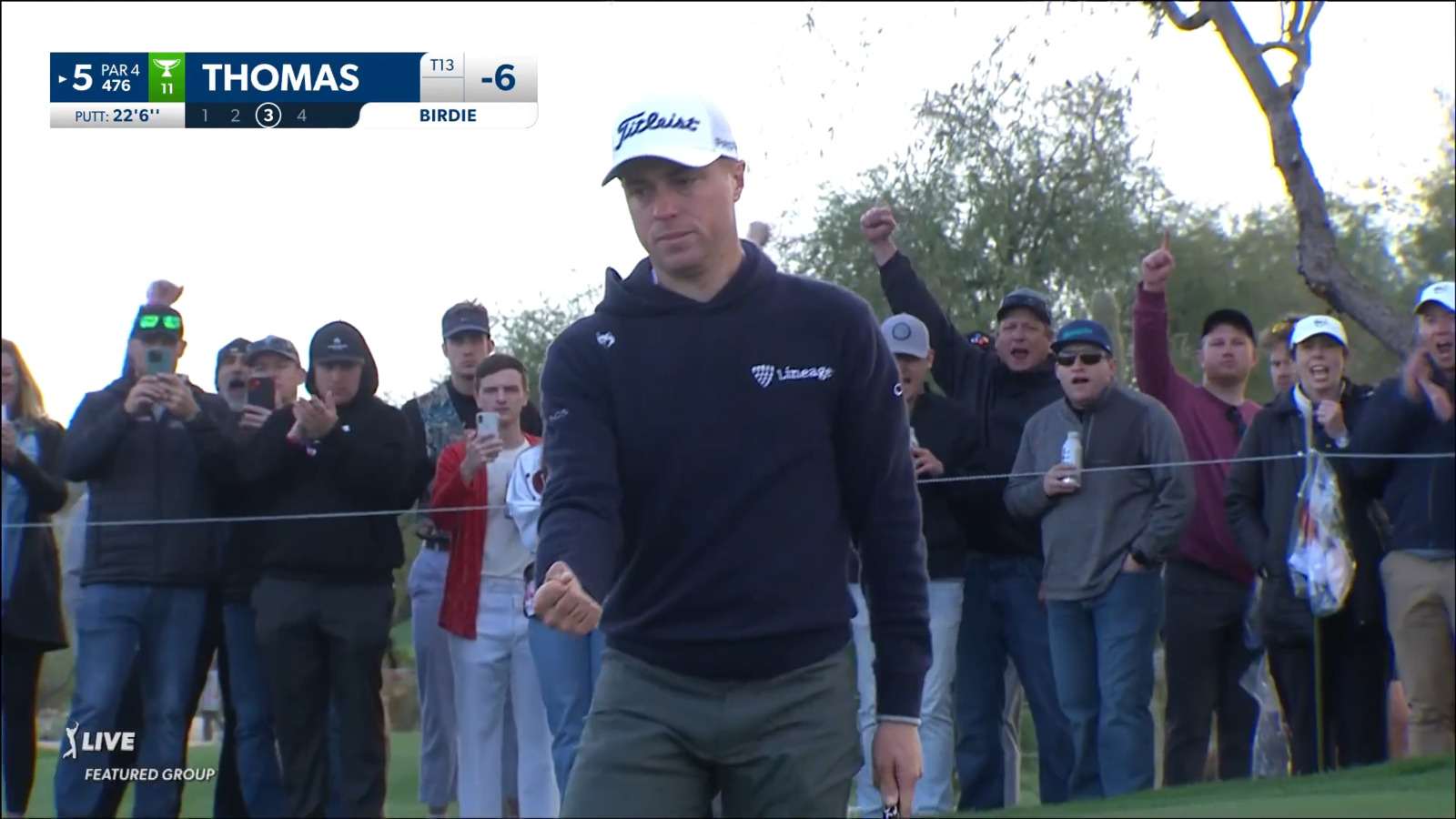 Justin Thomas sinks a center-cut 22-footer for birdie at WM Phoenix Open
