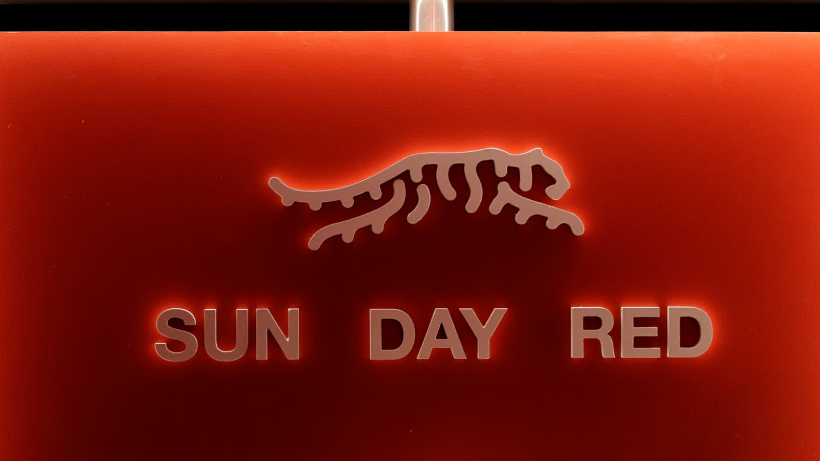 Tiger Woods launches Sun Day Red