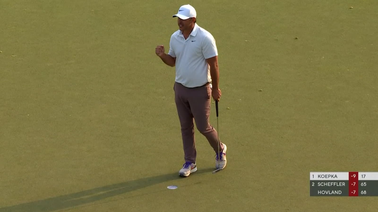 Brooks Koepka pars the last to win at the PGA Championship