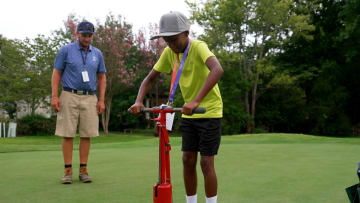 11-year-old lawncare entrepreneur meets agronomy crew at TPC Southwind