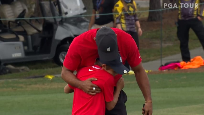 Charlie & Tiger Woods celebrate after birdie on No. 18 at PNC Championship