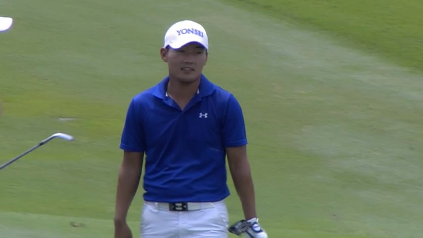 Sung Kang stuffs his approach from 125 yards at CIMB