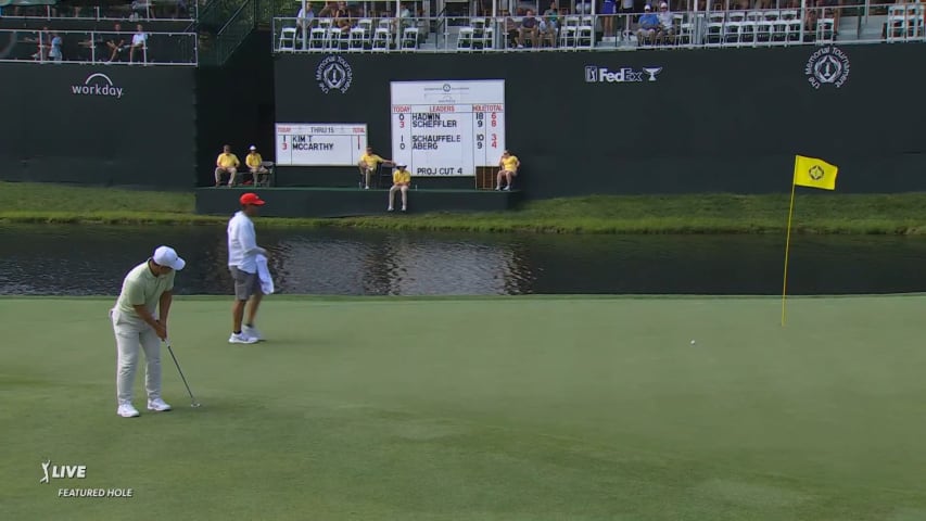 Tom Kim holes 33-footer for birdie at the Memorial