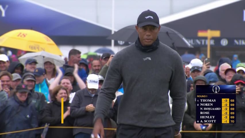 Tiger Woods drains long birdie putt from off the green at The Open